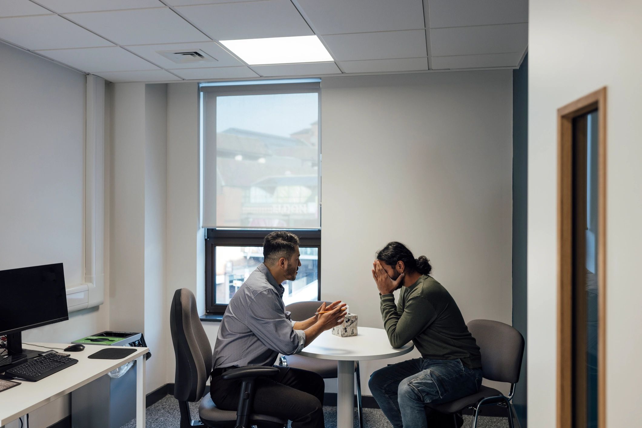 Professionals in a private consultation meeting